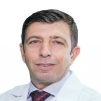 Dr. Christos Karavolias